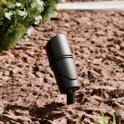 KICHLER Varia 16311 9.8W LED Medium Accent Light Selectable CCT Textured Black installed in landscape, daytime