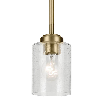 The Winslow 7.5" 1-Light Mini Pendant Light with Clear Seeded Glass in Natural Brass on a white background
